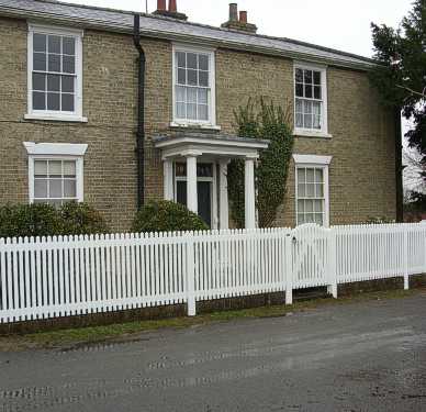Painted picket fencing with specification to customers requirements.